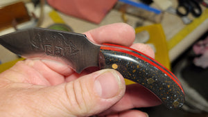 The Fire fighter Brigham High Carbon Steel with Black and Red Paper Micarda