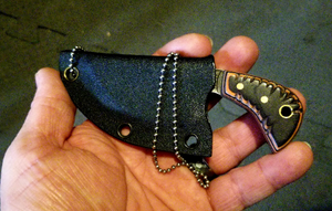 The Piranha high carbon steel with kydex sheath and ball chain necklace