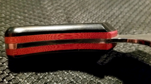 The Fire fighter Brigham High Carbon Steel with Black and Red Paper Micarda