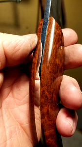 Upswept high carbon steel blade with snakewood handle